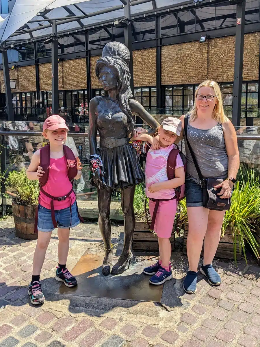 Kirsty and the girls with the Amy Winehouse statue at Camden market.