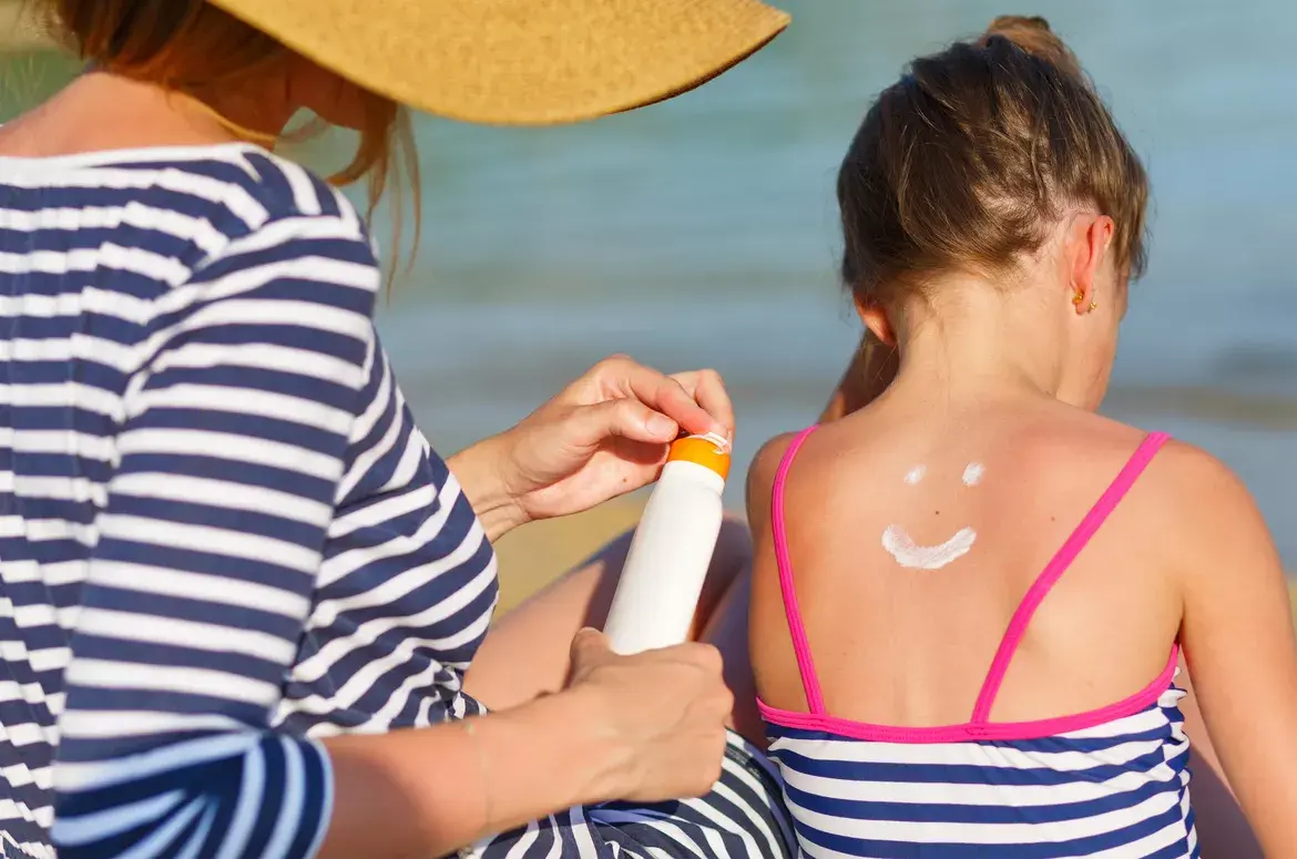 Sun cream is essential for Avoiding Sunburn and Heatstroke when Travelling With Kids