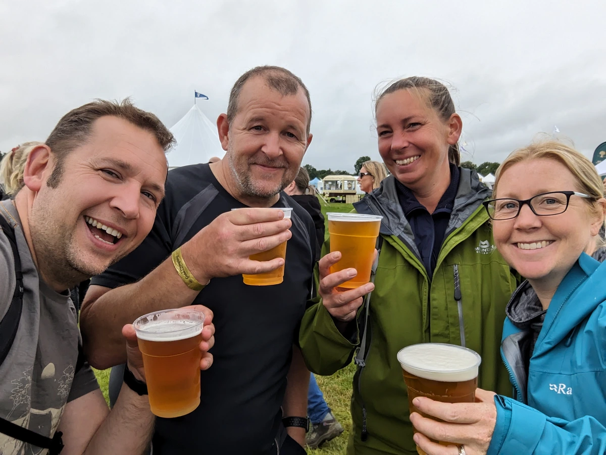 4 adults enjoying a pint of average beer at the Yorkshire Dales Food and Drink Festival